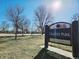 Chaffee Park sign during daytime with grass, trees, and blue sky at 2804 W 53Rd Ave, Denver, CO 80221