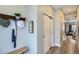 Light and bright entryway with bench and coat rack at 2804 W 53Rd Ave, Denver, CO 80221