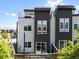 Modern townhouse featuring a rooftop deck and outdoor access from the main living area at 2804 W 53Rd Ave, Denver, CO 80221