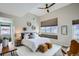 Spacious main bedroom with plush bedding and stylish decor at 2804 W 53Rd Ave, Denver, CO 80221