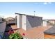 Spacious rooftop deck with a view, featuring durable composite flooring and outdoor storage at 2804 W 53Rd Ave, Denver, CO 80221