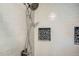 Shower with modern fixtures and stone accents at 2804 W 53Rd Ave, Denver, CO 80221