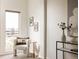 Cozy bedroom corner with a comfortable chair and modern decor at 2680 Blake St # 12, Denver, CO 80205
