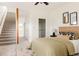Well-lit bedroom with stairs, closet and stylish decor at 2680 Blake St # 12, Denver, CO 80205