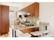 Well-equipped kitchen with stainless steel appliances, granite countertops and stylish cabinetry at 2680 Blake St # 12, Denver, CO 80205