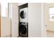 Laundry closet with modern washer and dryer at 2680 Blake St # 12, Denver, CO 80205