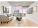 Bright living room with city views and modern furnishings at 891 14Th St # 2914, Denver, CO 80202