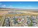 Aerial view of a lakeside community showing the home's location and surrounding landscape at 11269 Star Streak Rd, Littleton, CO 80125