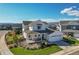 Charming two-story home with a welcoming front porch and manicured landscaping at 11269 Star Streak Rd, Littleton, CO 80125