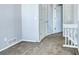 Simple hallway with neutral walls and carpet at 8232 W 90Th Pl, Broomfield, CO 80021