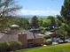 Scenic aerial view overlooking lush greenery and mountain views at 1470 S Quebec Way # 46, Denver, CO 80231