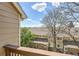 Balcony view overlooking roofs of attached condos and blue skies at 1470 S Quebec Way # 46, Denver, CO 80231