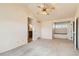 Bright bedroom featuring vaulted ceilings, a ceiling fan, and a cozy window seat at 1470 S Quebec Way # 46, Denver, CO 80231