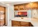Open kitchen view into a large carpeted living space at 1470 S Quebec Way # 46, Denver, CO 80231
