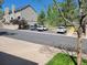 Community parking area with designated visitor spots and well-maintained landscaping at 1470 S Quebec Way # 46, Denver, CO 80231