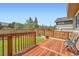 Secluded backyard featuring a wooden deck, lawn, and fence for privacy at 24416 E Powers Ave, Aurora, CO 80016