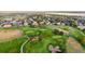 Scenic aerial showcasing the lush golf course with its manicured greens and meandering paths at 4121 S Allison St, Denver, CO 80235