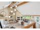 Bright, airy living room with vaulted ceilings and large windows at 4121 S Allison St, Denver, CO 80235
