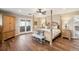 Spacious main bedroom with a sitting area and private patio access at 4121 S Allison St, Denver, CO 80235