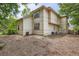 Expansive backyard with a neutral colored home, perfect for outdoor activities and relaxation at 912 S Galena St, Aurora, CO 80247