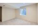 Spacious basement featuring plush carpet and a window for ample lighting at 912 S Galena St, Aurora, CO 80247