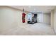 Finished basement featuring carpeted flooring, recessed lighting, punching bag, and treadmill at 912 S Galena St, Aurora, CO 80247
