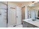 Bright bathroom with walk-in shower and vanity with modern fixtures at 912 S Galena St, Aurora, CO 80247