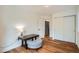 Comfortable bedroom featuring hardwood floors and a spacious closet at 912 S Galena St, Aurora, CO 80247