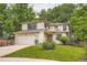 Charming two-story home featuring a well-maintained lawn and a two-car garage at 912 S Galena St, Aurora, CO 80247