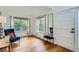 Bright living room with hardwood floors, large windows, and elegant décor accents at 912 S Galena St, Aurora, CO 80247