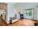 Cozy living room with hardwood floors, ample natural light, and stylish furnishings at 912 S Galena St, Aurora, CO 80247