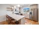 Modern kitchen featuring stainless steel appliances and quartz countertops at 3520 W Conejos Pl # 10, Denver, CO 80204