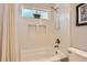Clean bathroom showcasing a white tub and shower combination at 8432 S Upham Way, Littleton, CO 80128