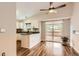 Eat-in kitchen with stainless appliances and vaulted ceiling at 8432 S Upham Way, Littleton, CO 80128