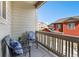 Relaxing balcony with outdoor seating and neighborhood views at 1631 Aspen Meadows Cir, Denver, CO 80260