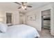 Comfortable bedroom showcasing a closet and an ensuite bathroom at 1631 Aspen Meadows Cir, Denver, CO 80260