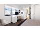 Bright bedroom with a large window, workstation, sleek modern desk, and contemporary decor at 2625 W 23Rd Ave, Denver, CO 80211