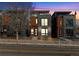 Modern homes featuring brick facades, balconies, and contemporary landscaping creating curb appeal at 2625 W 23Rd Ave, Denver, CO 80211