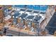 Street view of modern townhomes, featuring brick facades, rooftop patios, and updated landscaping at 2625 W 23Rd Ave, Denver, CO 80211