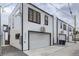 Modern exterior elevation showcasing the garage, and clean design at 2625 W 23Rd Ave, Denver, CO 80211