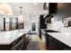 Stylish kitchen featuring a farmhouse sink, stainless steel appliances, and modern cabinetry at 2625 W 23Rd Ave, Denver, CO 80211