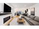Bright open-concept living room with dining area and modern kitchen at 2625 W 23Rd Ave, Denver, CO 80211