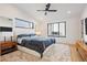 Tranquil main bedroom with a plush rug, modern furniture, and ample natural light at 2625 W 23Rd Ave, Denver, CO 80211