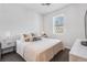 This bedroom features a cozy bed, plush pillows, and warm lighting for a relaxing atmosphere at 11487 W Grand Way, Littleton, CO 80127
