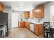 Bright kitchen with stainless steel appliances and plenty of counter and cabinet space at 2695 S Logan St, Denver, CO 80210