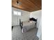 Charming bedroom with a vintage bed frame and patterned tile floors at 319 13Th Ave, Idaho Springs, CO 80452