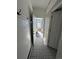 Inviting entryway with coat hooks and access to sunroom and other rooms at 319 13Th Ave, Idaho Springs, CO 80452