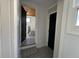 Hallway with patterned tile floor leading to a bedroom at 319 13Th Ave, Idaho Springs, CO 80452