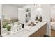 Bathroom features a dual sink vanity, modern fixtures, and sleek countertop at 3841 Stuart St, Denver, CO 80212
