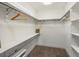 Walk-in closet with built-in shelving and ample storage space at 3841 Stuart St, Denver, CO 80212